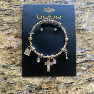 NEW Bebe gold charm bracelet and earring set